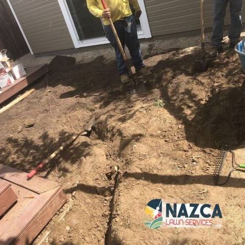Irrigation system installation on a Denver residential lawn
