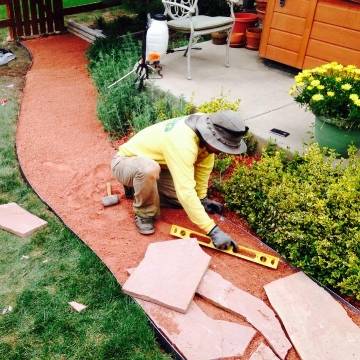 Stone pathway hardscaping installation by Nazca Services
